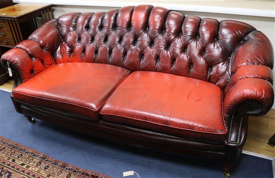 A large Ox blood leather Chesterfield, W.200cm